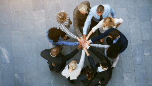 Professional insurance team in huddle